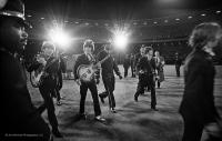 Beatles coming onto the stage at Candlestick Park, 1966 by Jim Marshall