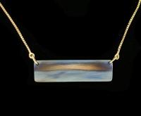N-407 Titanium flame painted horizontal bar with 14K gold chain by Kenneth Pillsworth